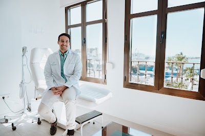 Dr. Gustavo Garriga Martina